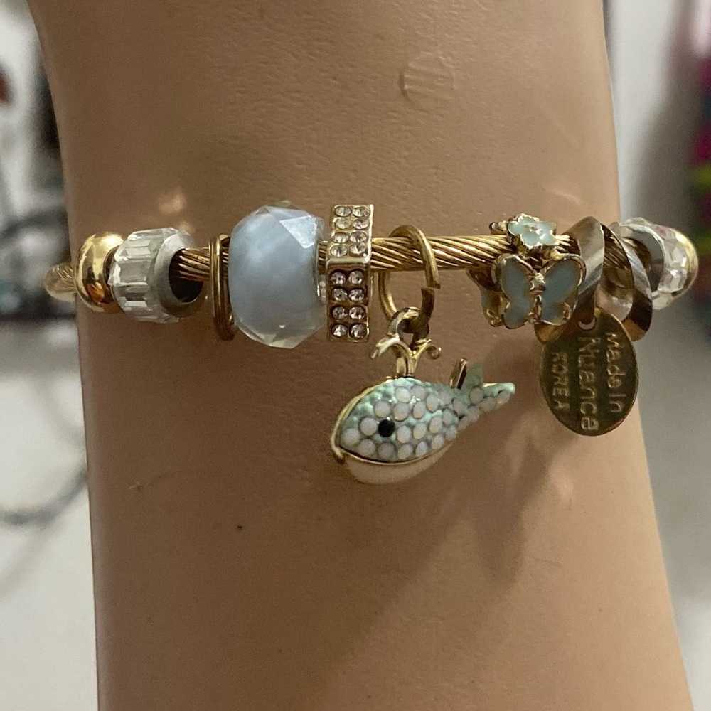 2/$5 Add another item to bundle. Charm bracelet, designer inspired.